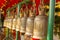 Hanging bell. Large black bell hanging in rows on a steel beam.Thailand