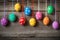 Hanging colorful eggs on wooden background