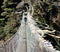 Hanging footbridge ower the dudh koshi nadi river