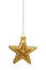 Hanging gold star Christmas ornament over white