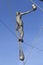 Hanging iron figures balancing on ropes on footbridge Bernatka,Krakow, Poland