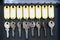 Hanging keys in metal cabinet for safety office or household keys management and keeping. keys with blank name tags, space for