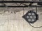 Hanging led light spot over grey dark concrete