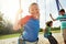 Hanging out with my best buddies. Portrait of a young boy playing on a swing at the park with his friends.