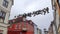 Hanging shoes at a wire in the old town of Flensburg in northern Germany