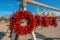 Hanging wreath of red chili peppers for sale on the side of the road at Tucson, Arizona