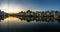 Hanoi cityscape at sunset. Resident buildings by Tien Bien lake, Gia Lam district