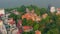 HANOI, VIETNAM - APRIL, 2020: Aerial drone view of the roof of the pagoda - holy temple near lake in the city of Hanoi.