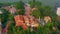 HANOI, VIETNAM - APRIL, 2020: Aerial drone view of the roof of the pagoda - holy temple near lake in the city of Hanoi.