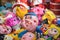 Hanoi, Vietnam - Aug 30, 2015: Toy masks for sale on Hang Ma street. The street are crowded and busy before Vietnamese Mid-Autumn