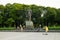 Hanoi, Vietnam - July 10, 2016: Vladimir Ilyich Lenin statue, with children playing game in Lenin park, Dien Bien Phu street