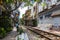 Hanoi, Vietnam - May 28, 2023: Train Street in Hanoi is a narrow, bustling lane with tracks. Close knit houses, adorned with