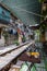 Hanoi, Vietnam - May 28, 2023: Train Street in Hanoi is a narrow, bustling lane with tracks. Close knit houses, adorned with