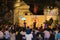 Hanoi, Vietnam - Nov 2, 2014: Tourist watch a free show of ancient folk music and song on Ma May street, old quarter of Hanoi