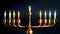 Hanukkah candlestick with nine burning candles