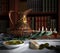 Hanukkah close up with candles, old books, spinning top