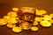 Hanukkah dreidel gold gelt coins on a table