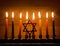 Hanukkah is a Jewish holiday. Burning Chanukah candlestick with candles. Chanukiah Menorah