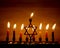 Hanukkah is a Jewish holiday. Burning Chanukah candlestick with candles. Chanukiah Menorah