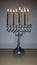 Hanukkah lamp with yellow and blue candles