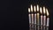 Hanukkah menorah with candles happy burning