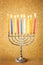 Hanukkah menorah over glitter background