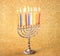 Hanukkah menorah over glitter background