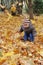 Happiness child playing in forest