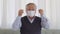 Happiness elderly asian man with white hairs take off medical face mask and smile at home,Cheerful older happy with clean and