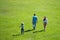 Happiness and harmony in family life. Happy family on summer walk. Father mother and child walking in the Park and