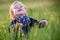 Happiness and joy child expression in a meadow