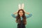 Happiness and joy. Preparing for Easter holiday. Small girl wear bunny ears. Kid in rabbit costume. Spring holidays