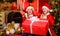 Happiness and joy. Santa crew. Girls friends sisters Santa claus costumes received gift. Santa party. Happy new year