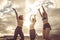 Happiness and joy for sport success active lifestyle - group of pretty females friends jumping on the air together for victory -