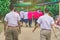 Happiness male students walk behind his girlfriends