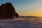 Happiness sunset moment on Olkhon island in frozen Baikal lake