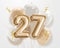 Happy 27th birthday gold foil balloon greeting background.