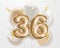 Happy 36th birthday gold foil balloon greeting background.