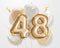 Happy 48th birthday gold foil balloon greeting background.