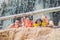 Happy adults and children in a water park