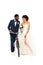 Happy african american bridegroom near cheerful bride with flowers holding bicycle