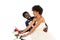 Happy african american bridegroom near cheerful bride with flowers riding bicycle