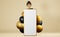 Happy African American character girl peeks out from big smartphone mockup beige background 3D rendering design balloons