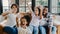 Happy African American family dad, mom and daughter having fun cuddle and video call on laptop on sofa at house. Self-isolation,