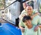 Happy African American Family In Front of Their Beautiful RV