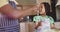 Happy african american father and daughter baking together, playing with flour in kitchen