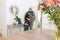 Happy african american male soldier embracing daughter at home, copy space