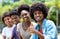 Happy african american man with group of young adults in line