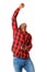 Happy african american man holding phone and cheering with arm raised