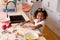 Happy african american messy girl baking in kitchen